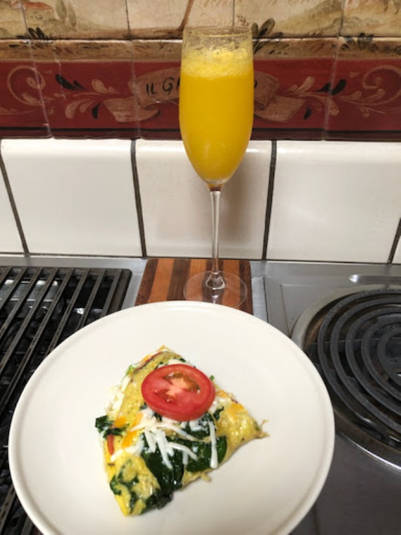 Summertime meals from Team Lind - Spinach and Tomato Omelet for Two best served with a mimosa